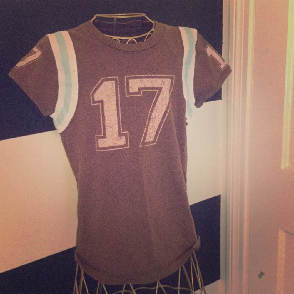 I am selling this brown blue and pink T-shirt.